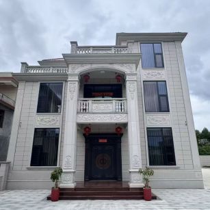 临沧 芝麻白石材别墅干挂案例展示